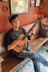 Armand Aromin holding his ukulele